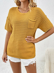 Textured knit t-shirt in mustard yellow with short sleeves and a chest pocket.