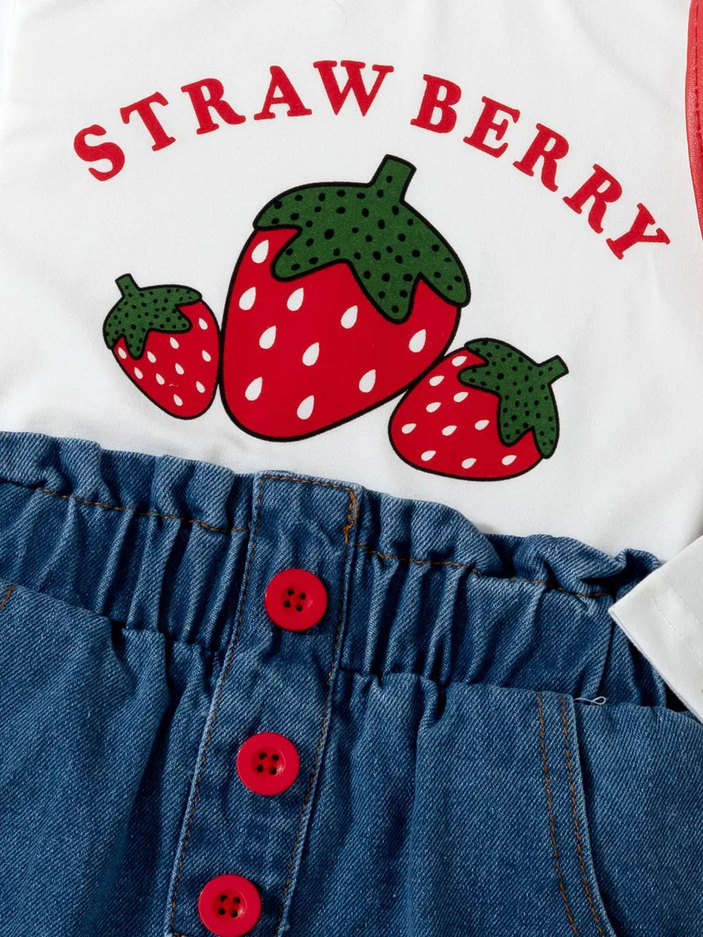 Children's Strawberry Long Sleeve Top And Jeans Set in White, close-up detail