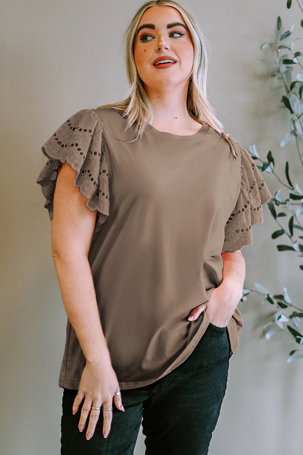 Eyelet flutter sleeve tee in mocha with ruffled details and a crew neck.