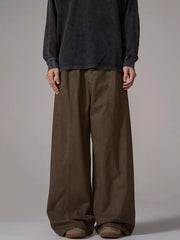 Brown comfortable wide-leg men's sweatpants with pockets and seam detail
