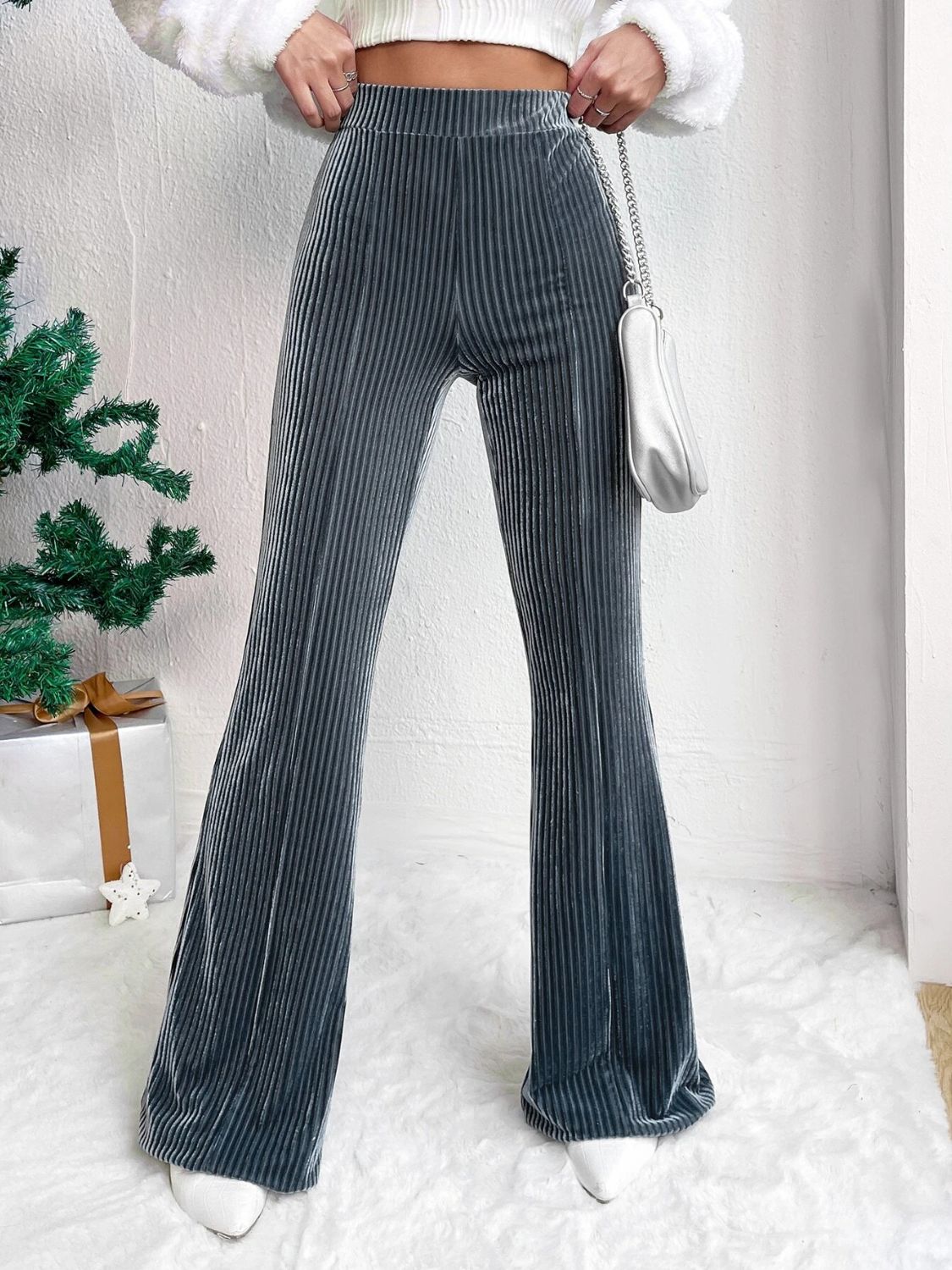 Textured corduroy bell bottom trousers in Teal with vertical ribbing.