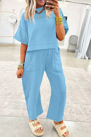 Light blue cotton boxy tee and relaxed barrel pants set with crew neck and drawstring waist.