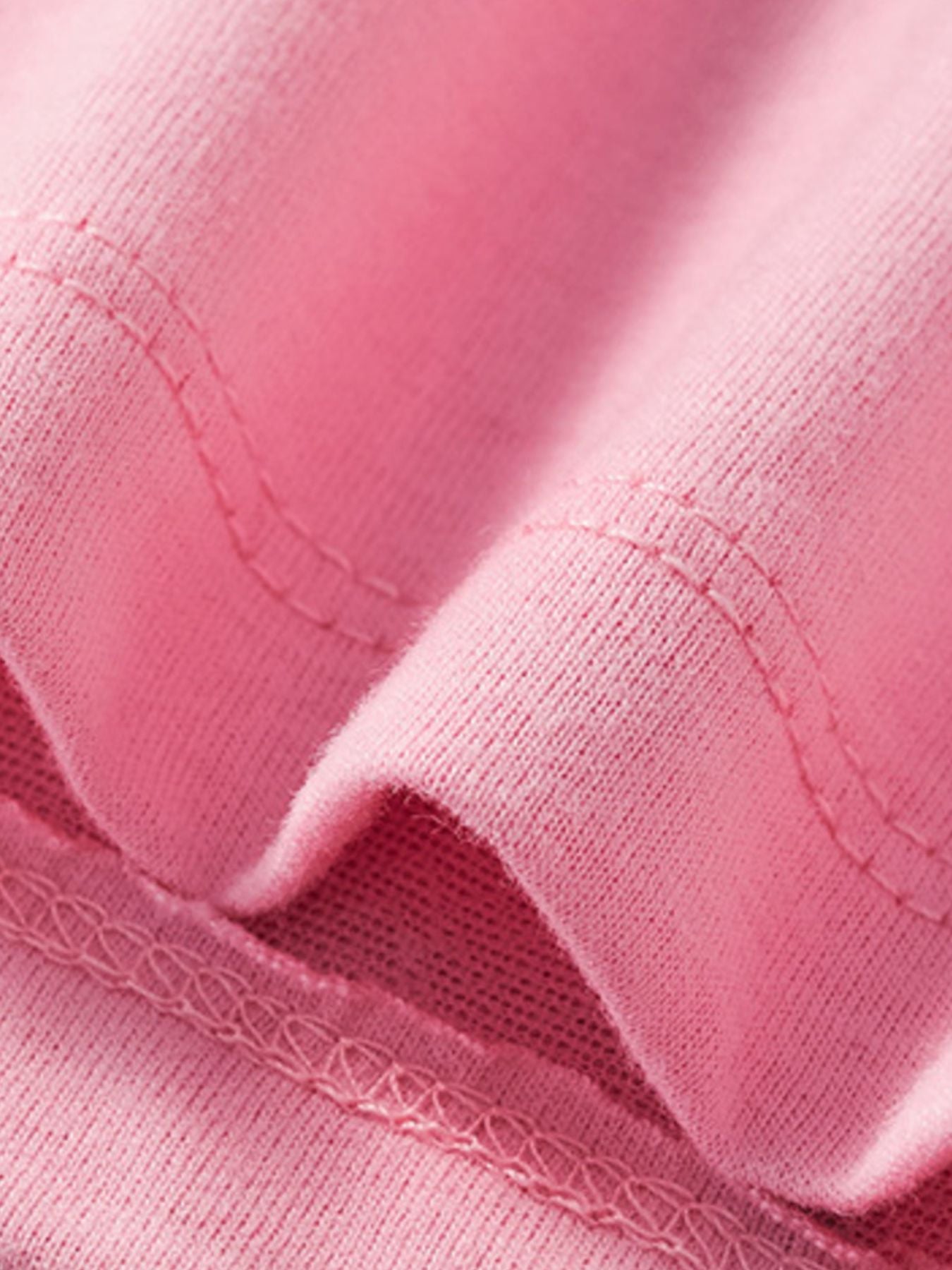 Blush pink baby tee with ruffle sleeve detail and stitched seams