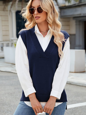 Dark Blue ribbed knit V-neck sweater vest with a white collared shirt and jeans.