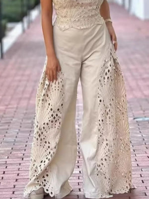 Apricot openwork two-piece ensemble with intricate lace details on wide-leg pants.