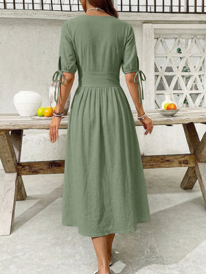 Sage button-down midi dress with tie sleeve details and a-line skirt