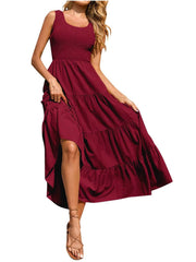 Burgundy smocked bodice ruffled maxi dress with tiered skirt and square neckline.