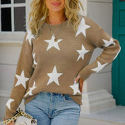 Taupe acrylic crewneck sweater with white stars, long sleeves, and ribbed cuffs.