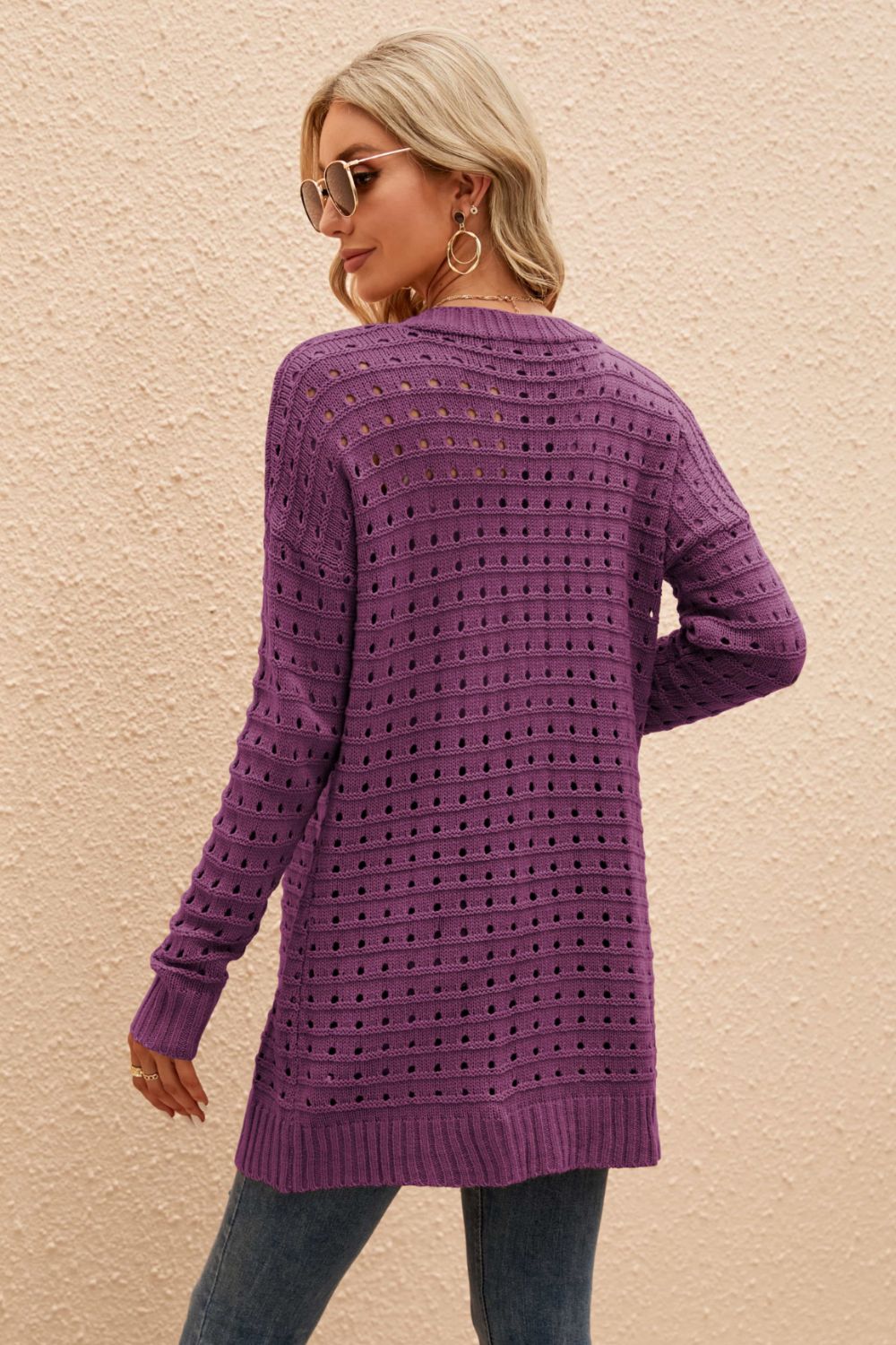 Purple perforated knit longline cardigan with long sleeves and ribbed hem.