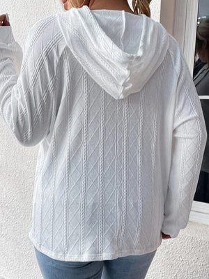 White textured knit raglan hoodie with cable knit diamond pattern.