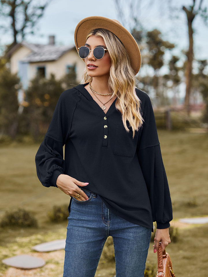 Black ribbed henley hoodie with balloon sleeves and button detail