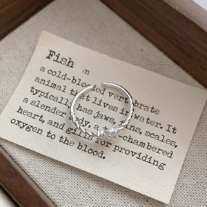 Twisted band sterling silver ring with delicate zircon flower detail.