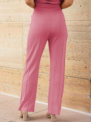 Seamed knit wide-leg pants in Dusty Pink with vertical seam details.