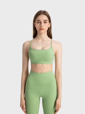 Strappy back active crop top in Yellow-Green with a square neckline.