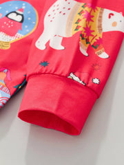 Children's red Christmas pajama set with polar bear and penguin print.
