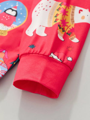 Children's red Christmas pajama set with polar bear and penguin print.