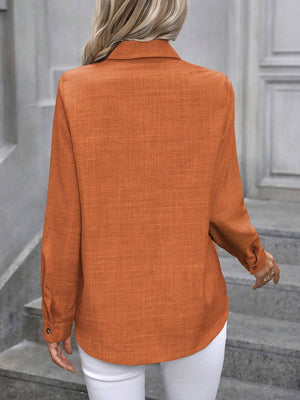 Orange linen-blend button-down shirt with long sleeves and button cuffs.