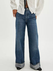 Cuffed wide-leg denim trousers in light blue with a high waist and button fly.