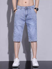 Light blue washed denim shorts for men, classic fit, cotton, buttoned closure.