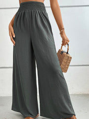 Dark Gray textured smocked waist palazzo maternity trousers with wide legs.