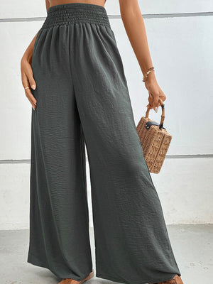 Dark Gray textured smocked waist palazzo maternity trousers with wide legs.