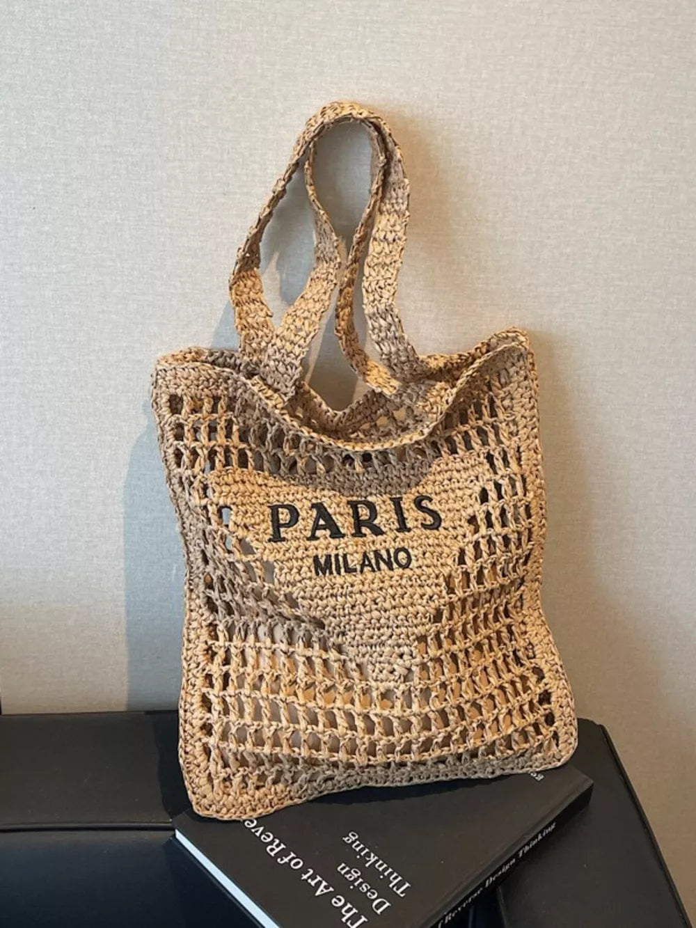 Khaki crochet tote bag with "PARIS MILANO" text detail