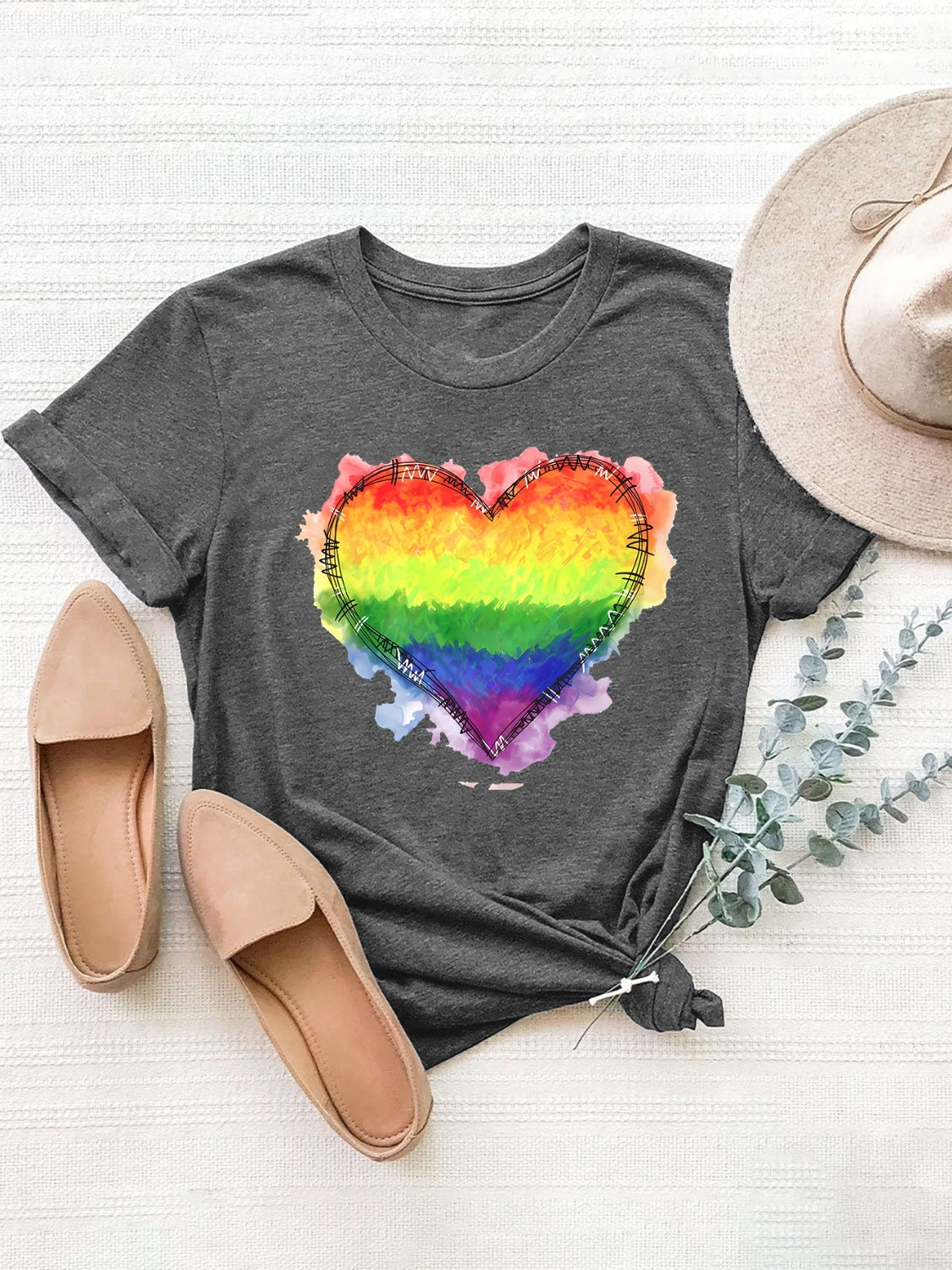 Dark Gray T-shirt with rainbow heart graphic and watercolor splash detail.