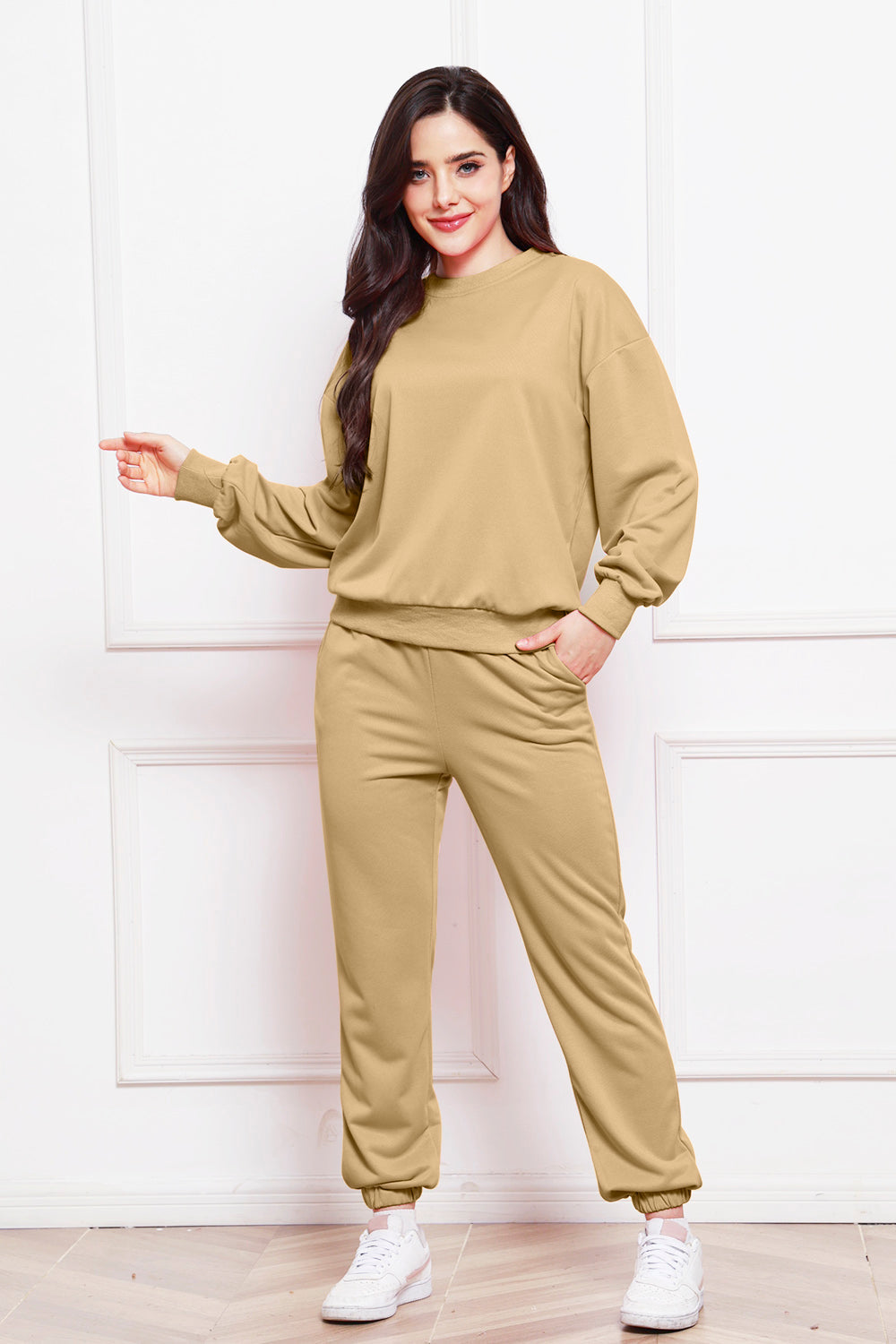 Relaxed fit khaki loungewear set with crewneck sweatshirt and jogger pants.