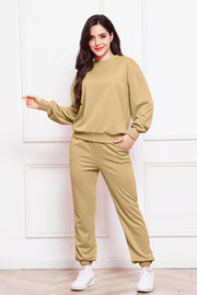 Relaxed fit khaki loungewear set with crewneck sweatshirt and jogger pants.