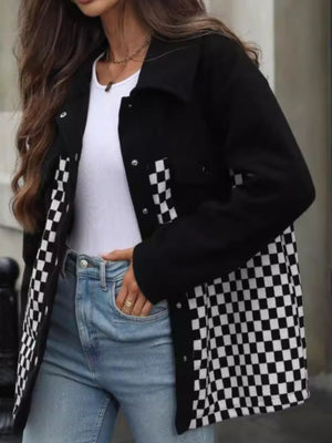 Black button-up jacket with checkerboard panels and a collared neckline.