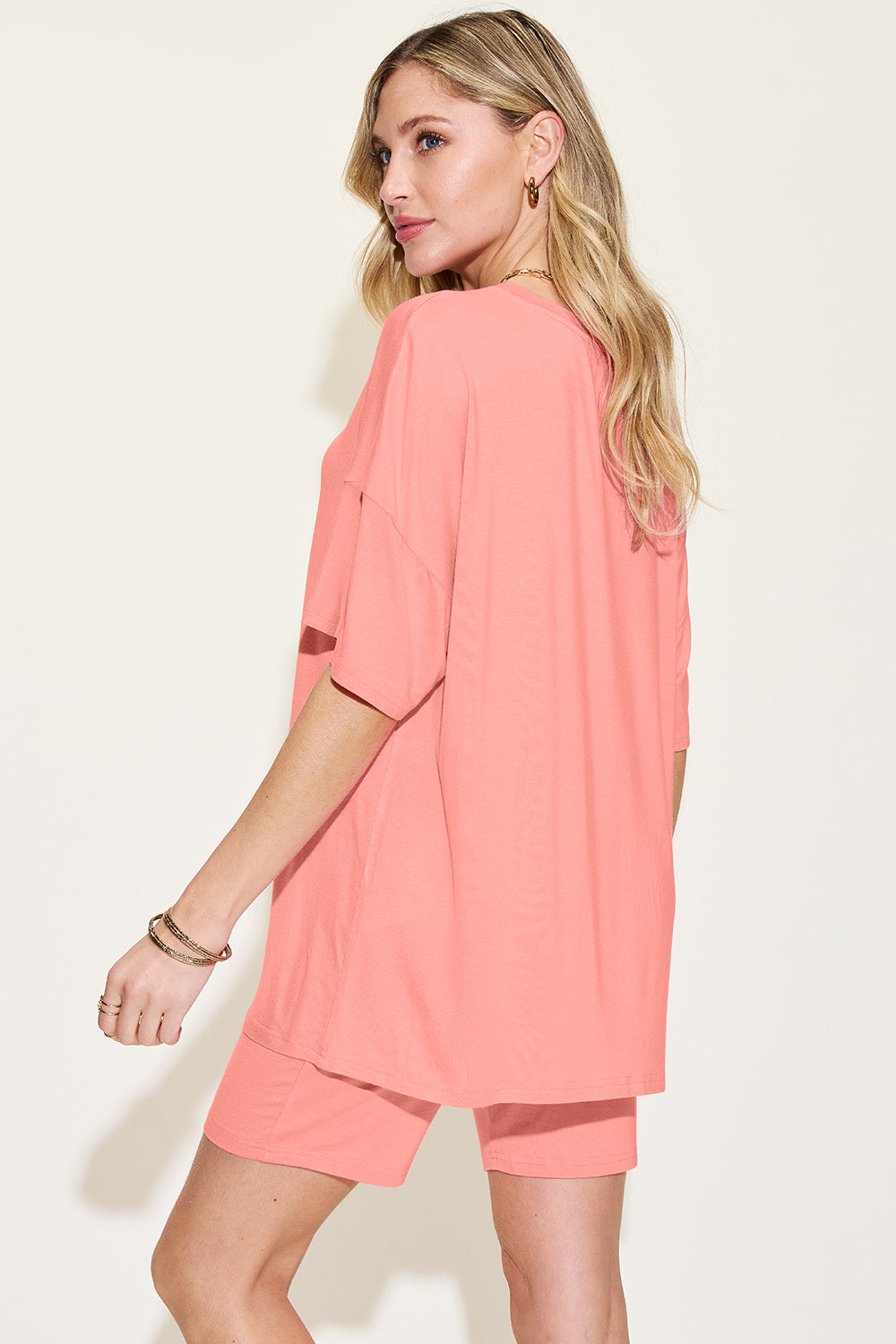 Coral relaxed tee and short loungewear set with short sleeves and a crew neck.