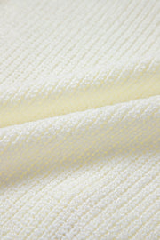 Beige textured knit tank top with a subtle pattern, acrylic fabric.