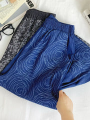 Blue printed comfort jeans with drawstring waist and elastic waistband.
