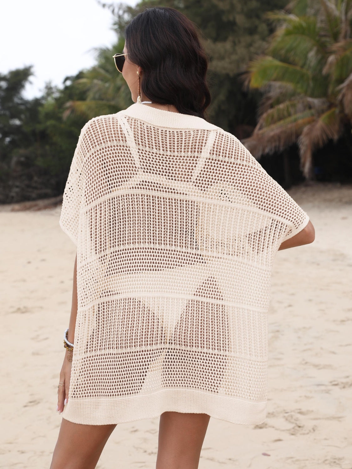 Open-knit polo beach dress in tan with short sleeves and a relaxed fit, perfect for layering over swimwear.