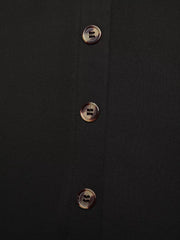 Black midi skirt with tortoise shell button front detail