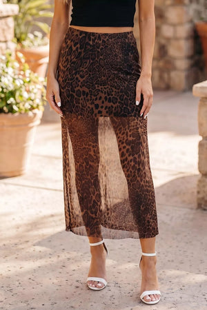 Sheer leopard print midi skirt with a breezy, casual style.