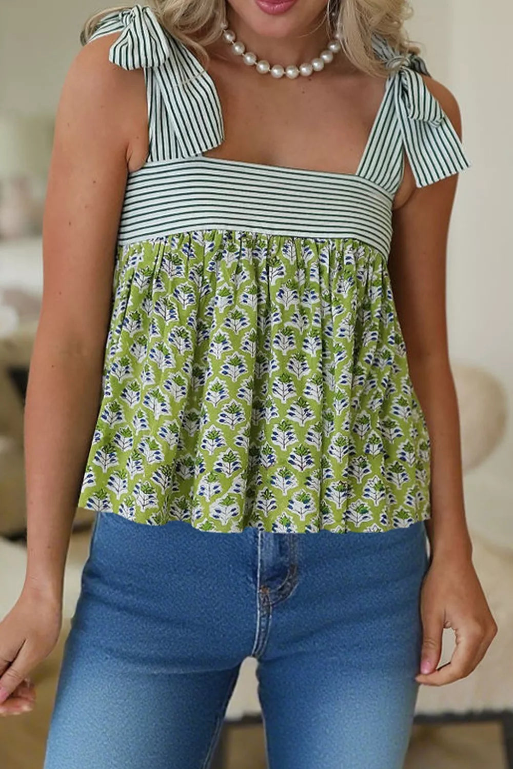 Floral tie-strap tank top with square neckline and green/blue print
