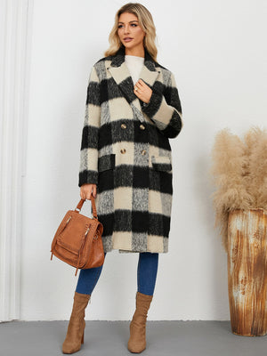 Checked plaid double-breasted cocoon coat in black and cream with gold buttons.