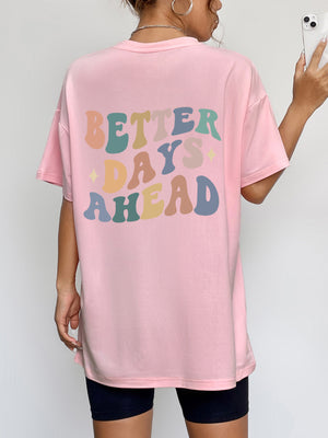 Oversized blush pink graphic tee with retro "Better Days Ahead" text and star details.