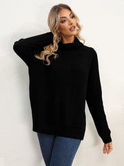 Black textured knit oversized turtleneck pullover sweater with a relaxed fit.