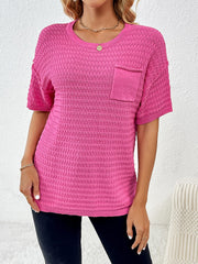 Hot pink textured knit t-shirt with boxy silhouette and chest pocket.