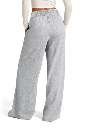 Gray seamed palazzo lounge trousers with elastic waist and pockets, wide leg.