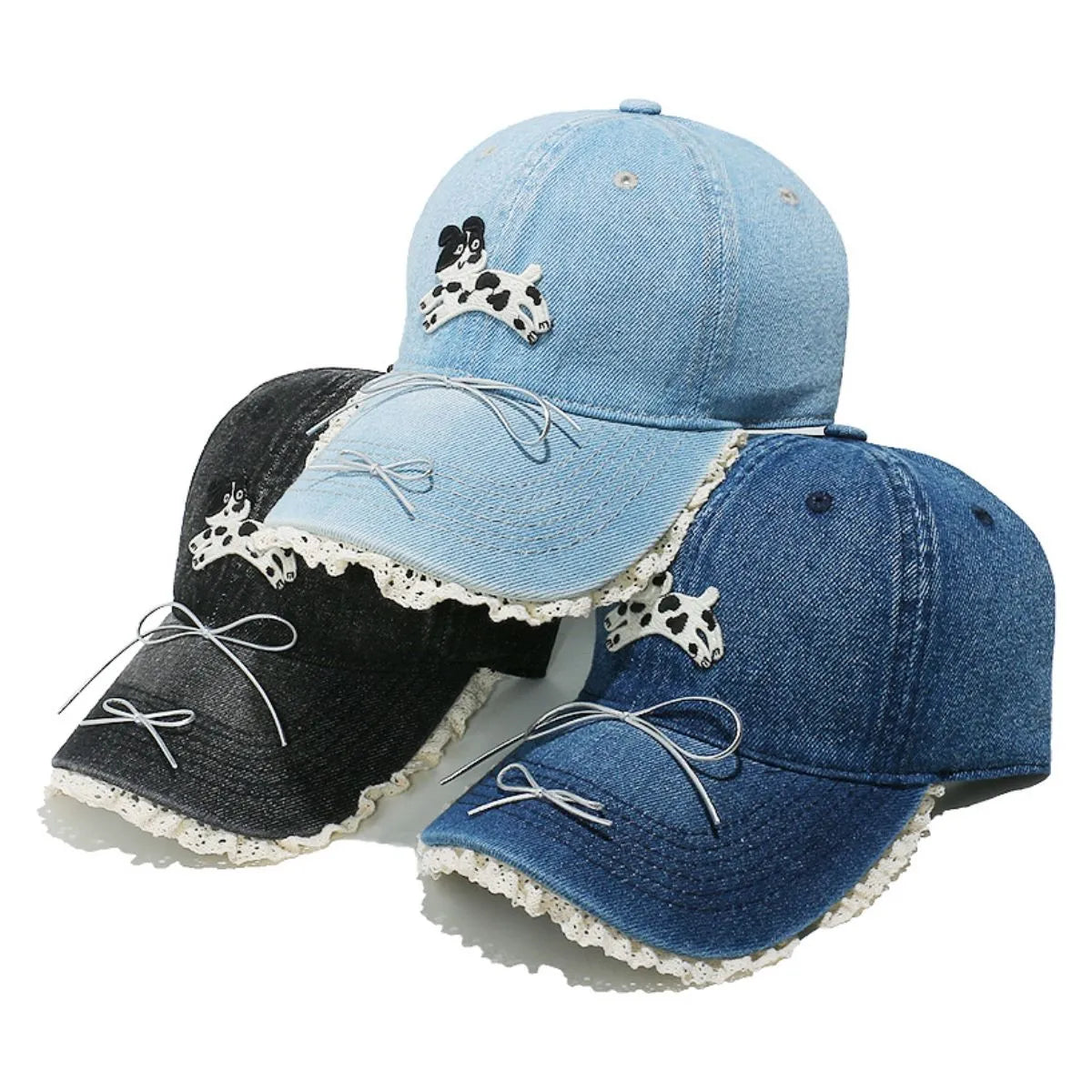Denim baseball cap with puppy appliqué and lace trim, available in light blue, indigo, and black.