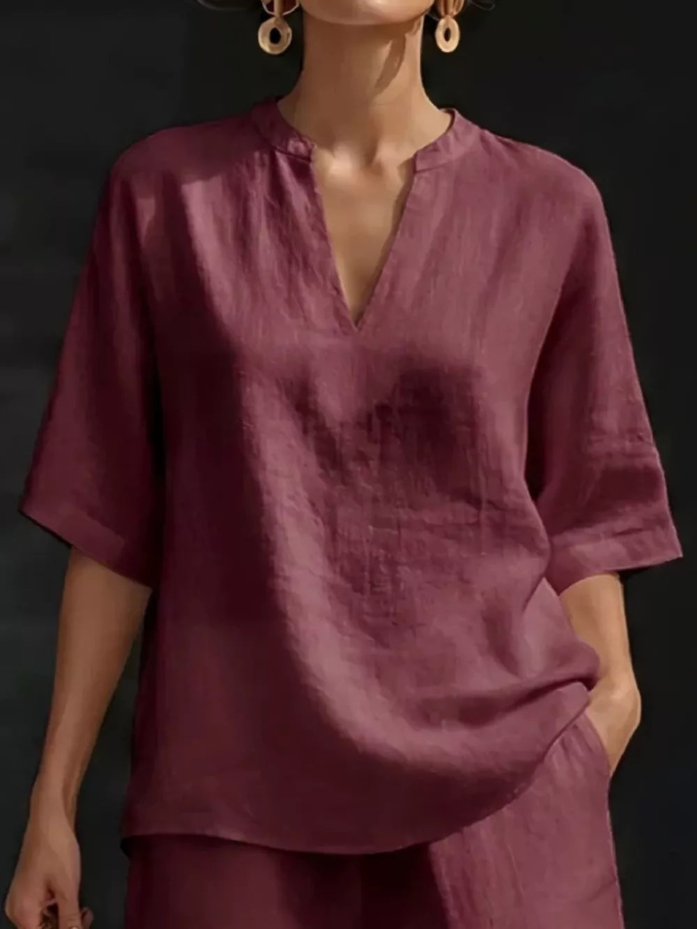 Fuchsia pink oversized linen blend two-piece set with V-neck top and pockets.