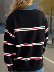 Black knit crewneck pullover with red and white nautical stripes and a denim collar detail.