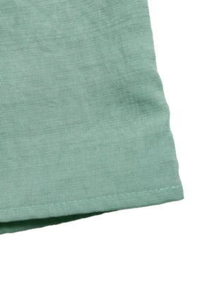 Maternity maxi dress in sage green linen-blend fabric with a subtle texture and neat hem stitching.