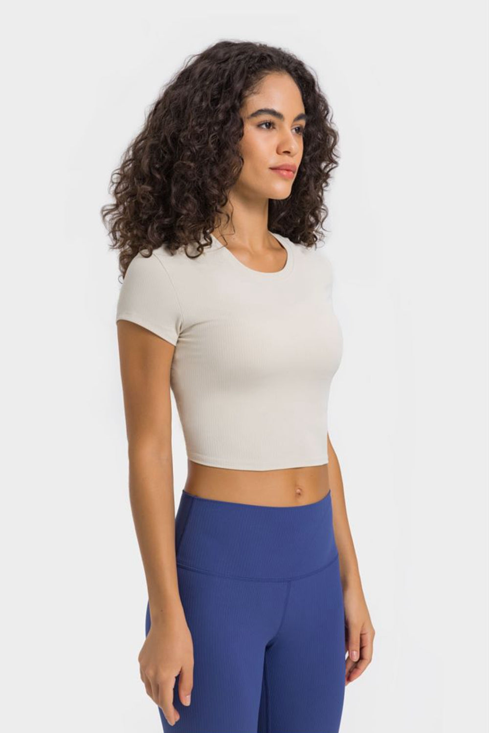 Ivory ribbed crewneck crop top with short sleeves
