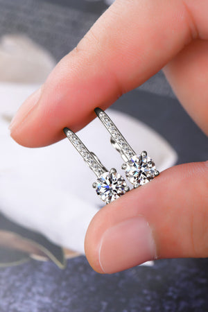 Silver leverback earrings with pavé-set moissanite and a round-cut center stone.