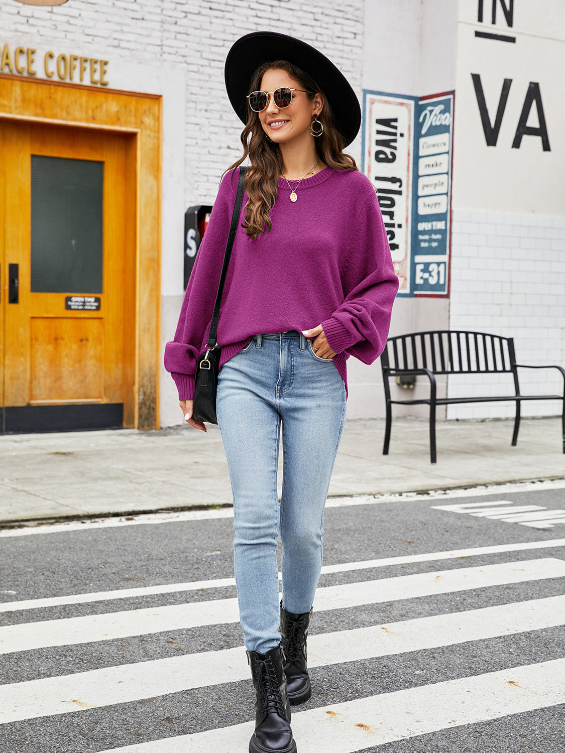 Fuchsia acrylic crewneck sweater with balloon sleeves, cuffed at the wrist.