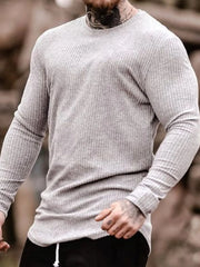 Light gray ribbed knit crewneck muscle fit top with long sleeves.